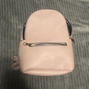 Small soft pink backpack